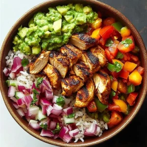 Sizzling chicken fajita burrito bowl with colorful veggies and spices